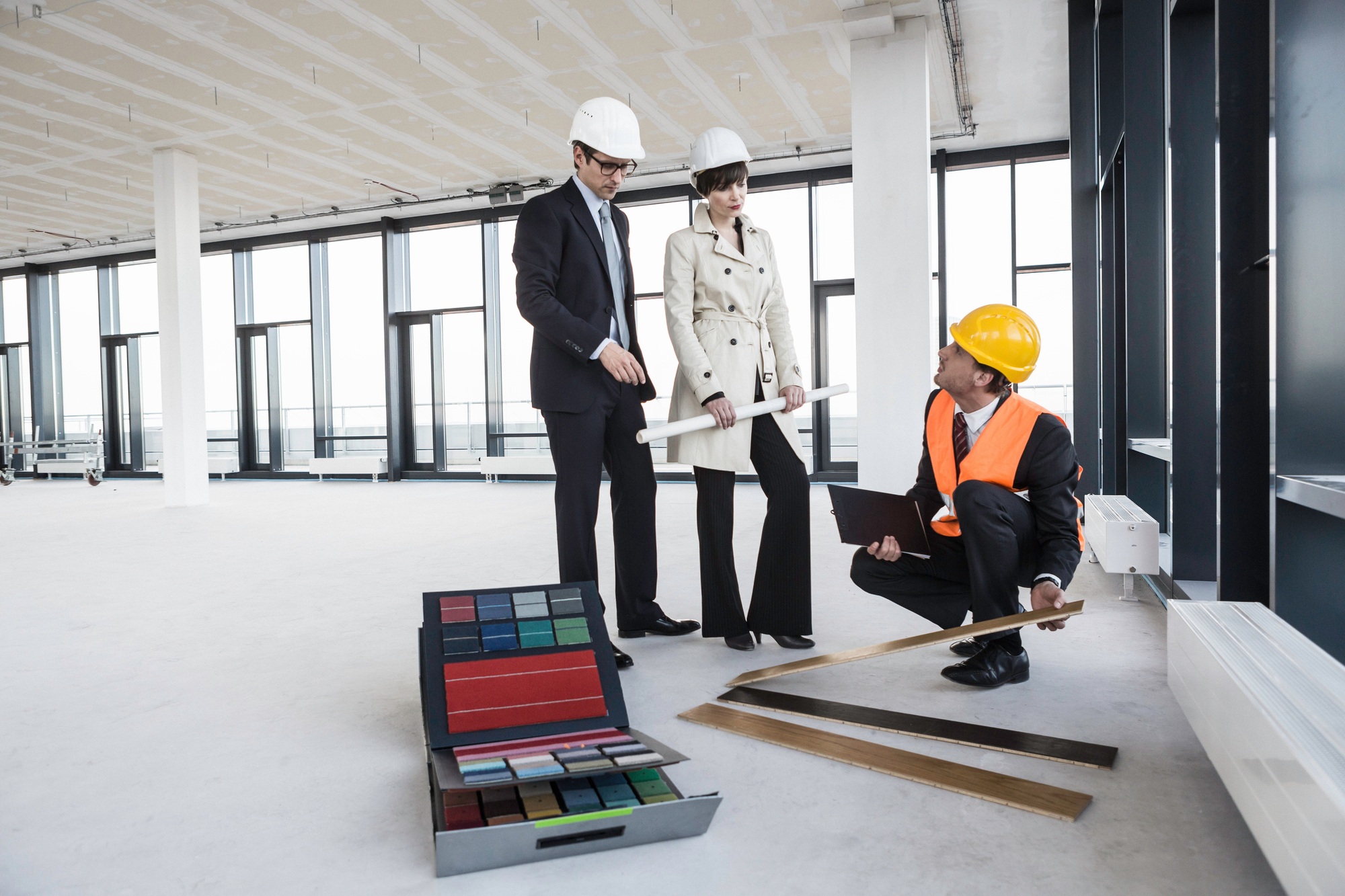Architects discussing flooring samples