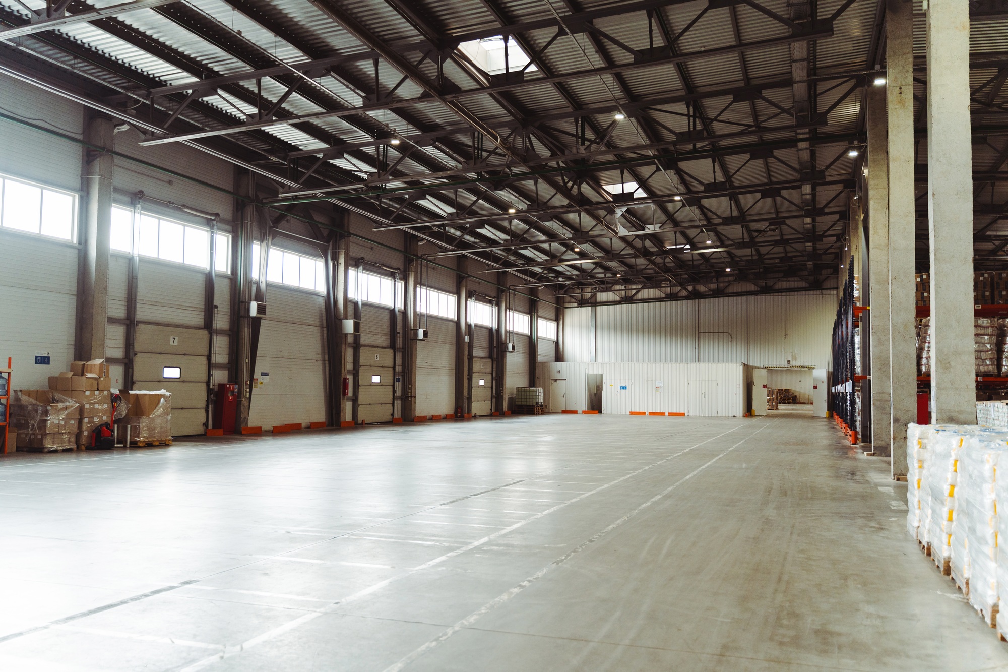 Light, warehouse building, warehouse for storing goods. Concept of logistics, delivery, distribution